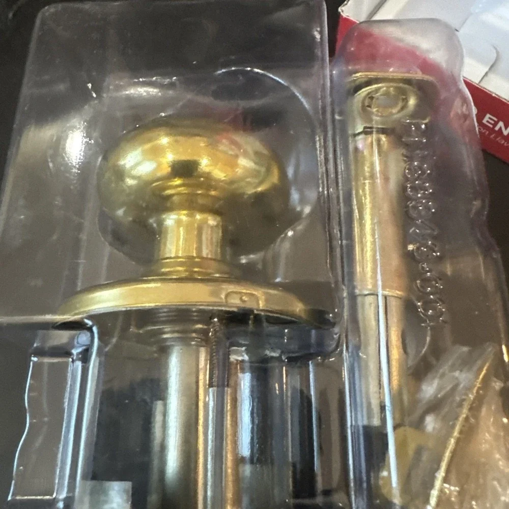 Kwikset‎ Juno SmartKey Polished Brass Entry Door Knob 97402-734